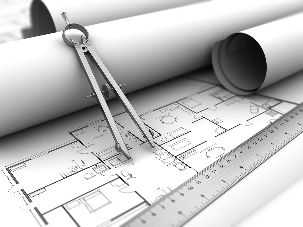 stock photo blueprints and drawing compass.jpeg